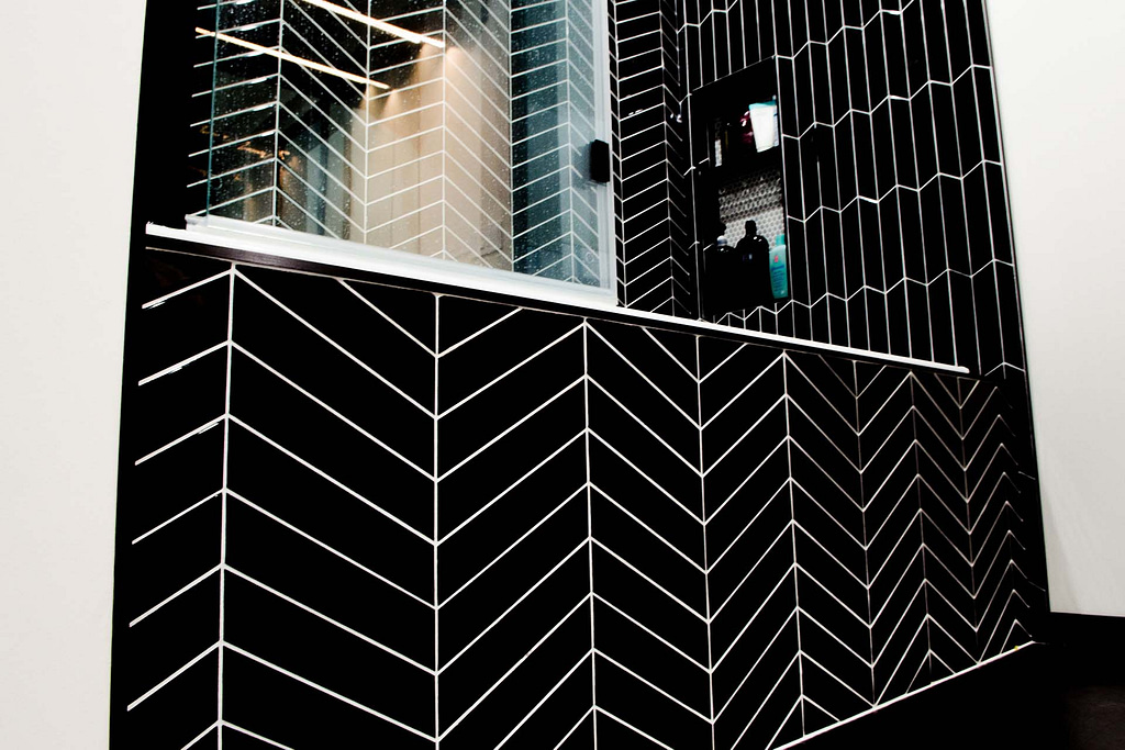 residential bathroom herringbone tiles by The Tile Centre, Brandon MB